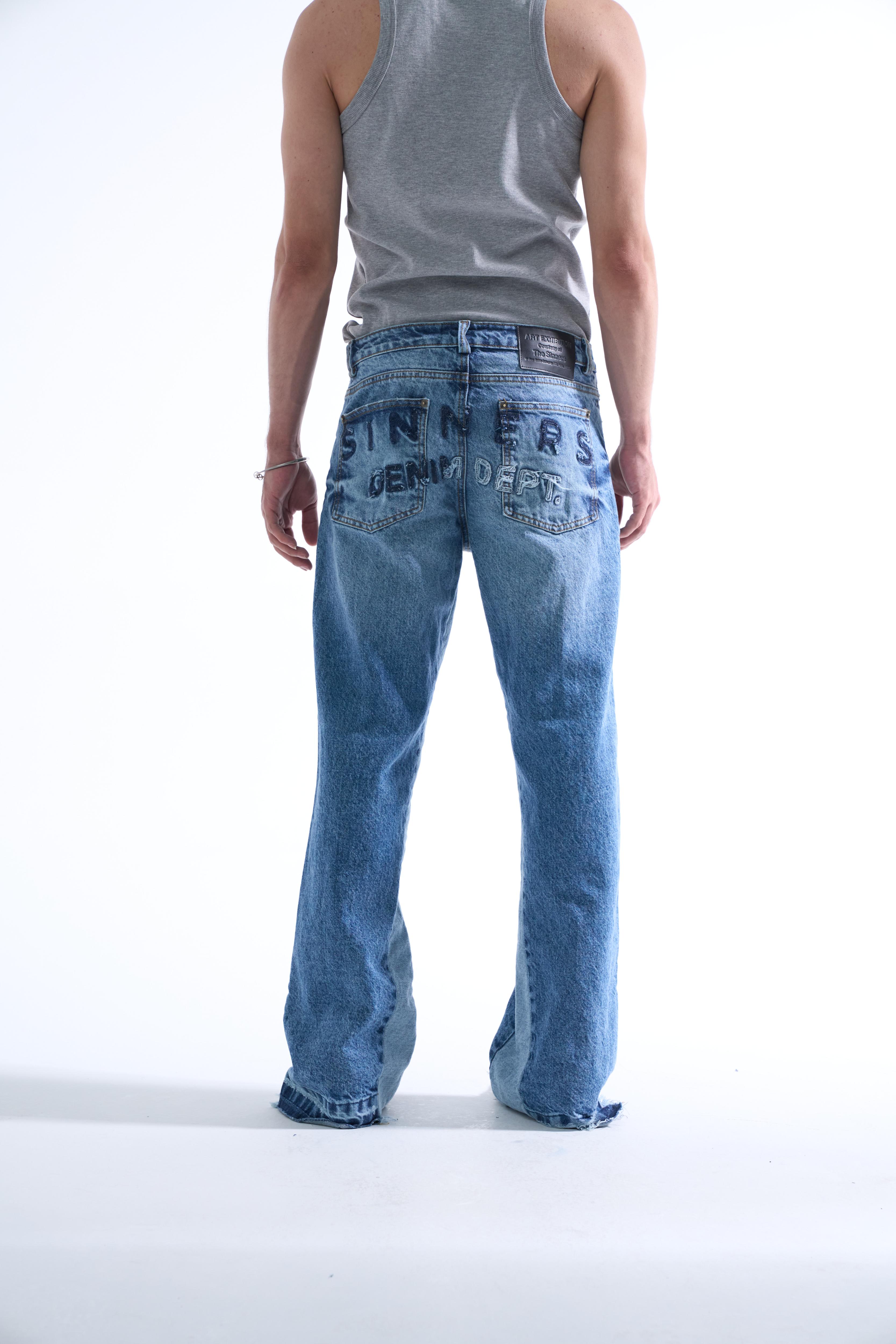 EMBROIDERED FLARED JEANS